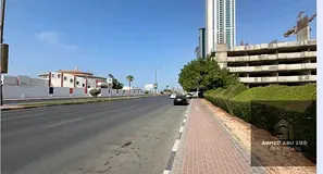 Prime Residential Land for Sale with Sea View – Rumaila 1, Ajman | Freehold | G+6 | Strategic Loca
