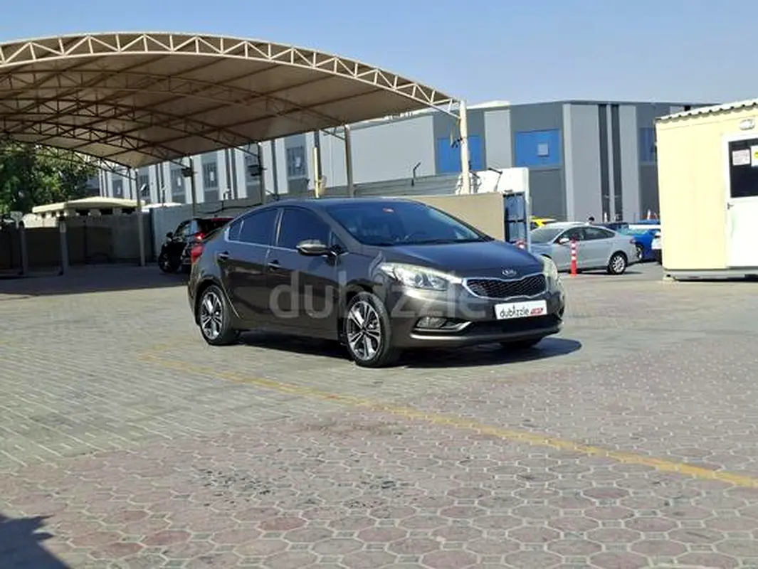 Kia Cerato 2014 — photo 1 of 13