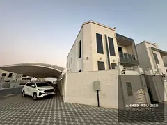 For rent in Al-Yasmeen: 5 master bedrooms, a majlis, a furnished living area, a spacious kitchen, an