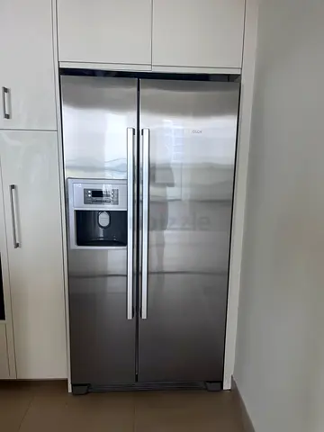 Brand new BOSCH Stainless Steel Side-by-Side Refrigerator with Water Dispenser