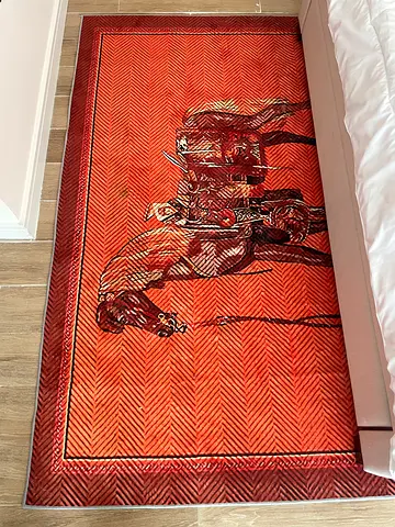 Red patterned area rug with vintage design - good condition