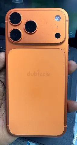 iPhone-style smartphone with orange camera cover and matching back panel