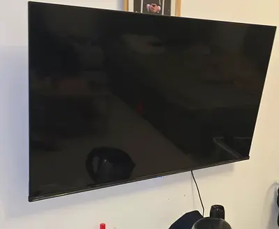 43 inch Flat Screen TV - Good Working Condition, Wall Mounted.medium fridge brand new. Bed sofa