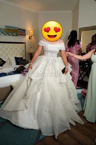 Used white wedding dress with long train and veil