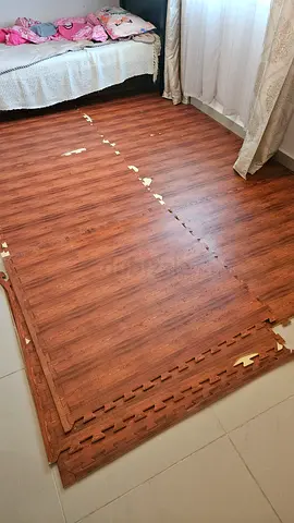 Interlocking foam floor mats with wood finish – used, some wear