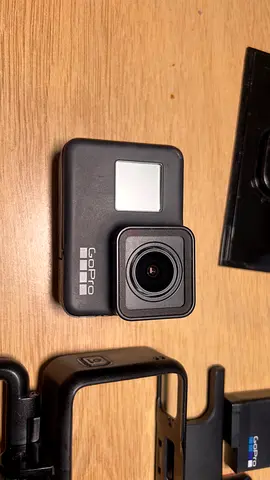 GoPro HERO action camera with mounts (used, good condition)