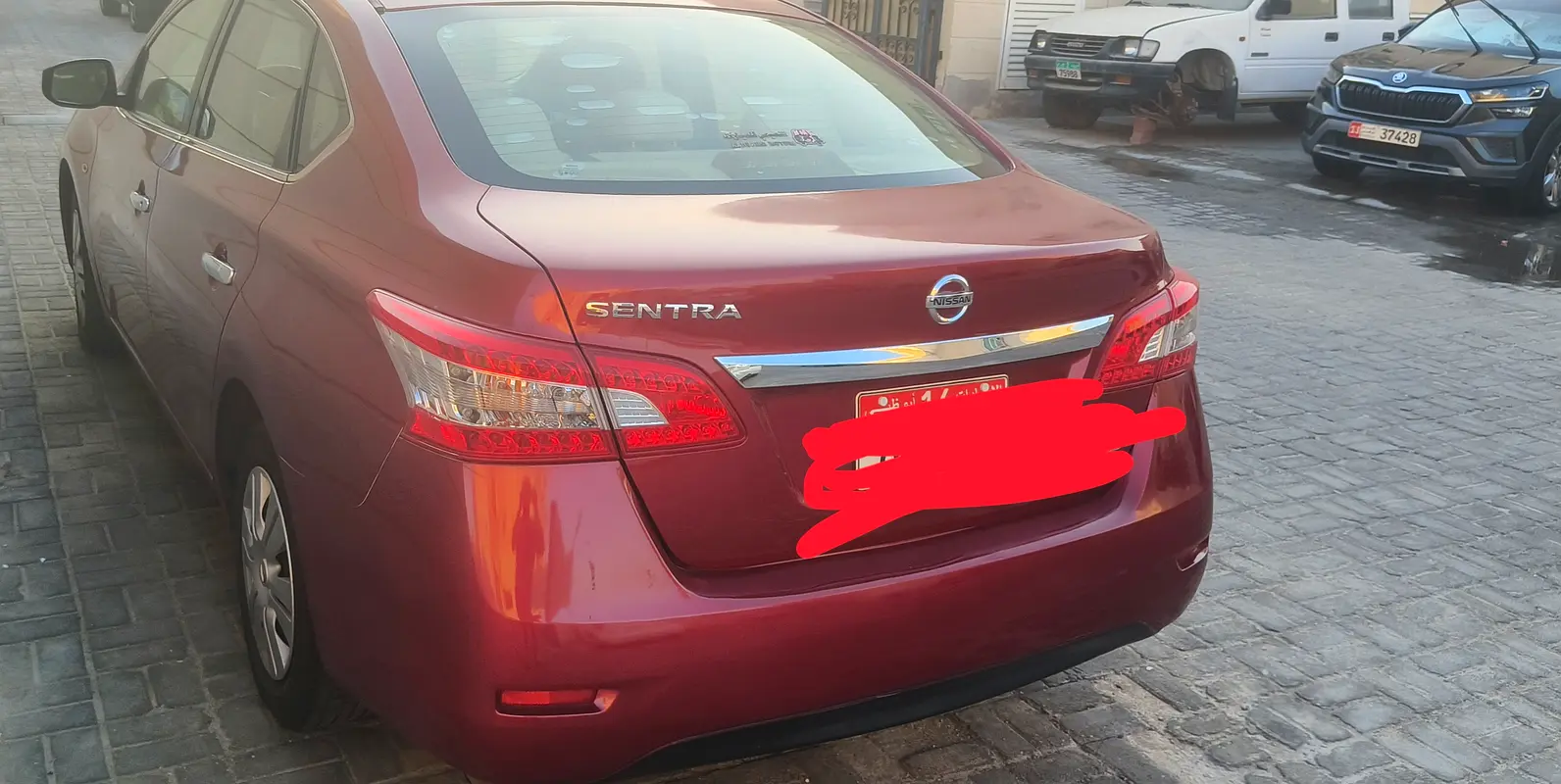 Nissan Sentra 2014 — photo 1 of 8