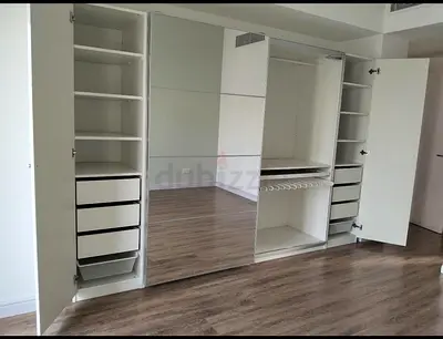Large White Built-in Wardrobe with Mirrored Sliding Doors