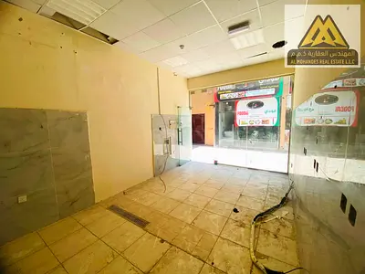 A commercial shop is available for annual rent in Al Hamidiya, Ajman, next to Garden City Towers. Located in a vibrant area surrounded by residential