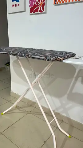 Lightweight folding ironing board in good condition