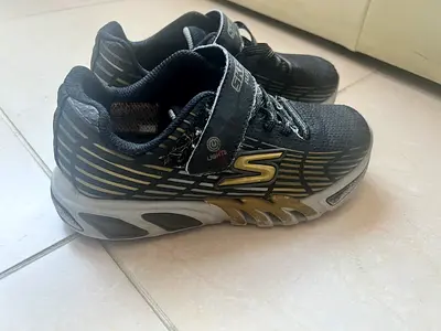 Boys Skechers light-up sneakers, black/gold, size US 3