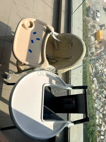 Two baby high chairs — used, sturdy feeding chairs