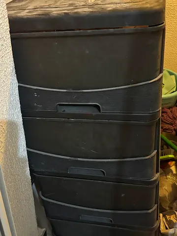 Tall black plastic storage cabinet with shelves - good condition very good