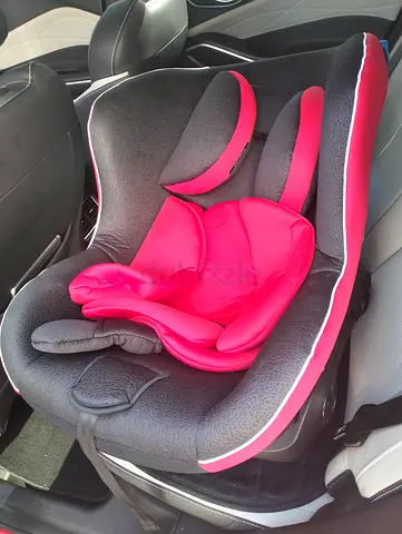 Used infant car seat - red/black, includes newborn inserts