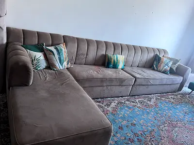 Large L-shaped velvet sectional sofa in brown — good condition