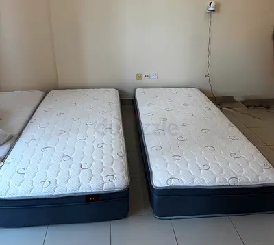 Two single mattresses in excellent condition
