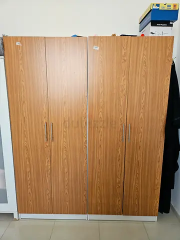 Two matching 2-door wooden wardrobes - good condition