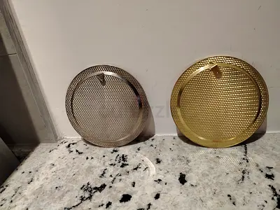 Set of 2 round metal vent/grill covers (gold and silver) - used