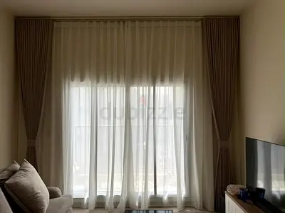 Full-length beige curtain set with sheer panels - ready to hang