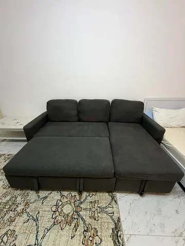 Dark grey 3-seater sofa bed - converts to large bed, good condition With storage area