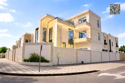 Villa (corner) (with swimming pool and elevator) | Ajman | Al Helio 2 | 7 rooms, majlis and 3 halls | Freehold | Price including registration fees, wa