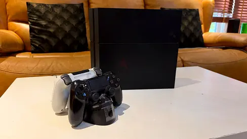 PlayStation 4 (1tb) with controller + controller charging stand