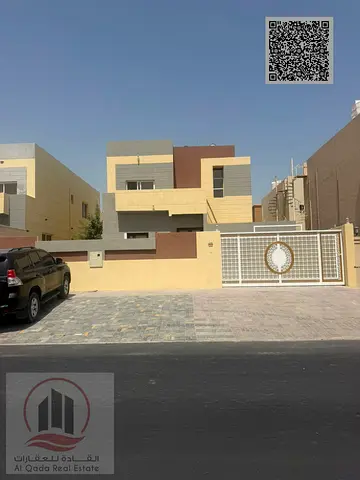 Villa for sale in Ajman, Al Muwaihat area. 5 master bedrooms, majlis, living room, and maid's room. Freehold ownership for all nationalities. Bank fin