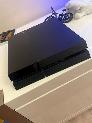 Neat and good Sony PlayStation 4 console - good working condition
