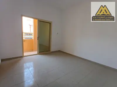 Two bedrooms and a large living room with a balcony offering an open view, located in Al Jurf 3 are