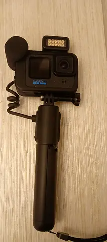 GoPro HERO action camera with accessories in hard case - good condition..