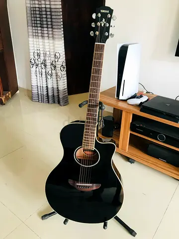 Yamaha Black Cutaway Acoustic-Electric Guitar - Very Good Condition