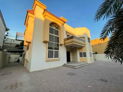 Villa for rent in Ajman, Al Mowaihat area  5 bedrooms, a living room, a full maid's room  With air conditioners, ready to move in  110 Oren required