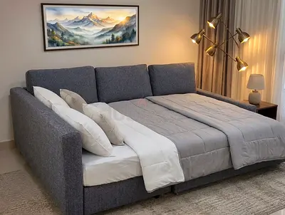 Space Saving Fabric Sofa Cum Bed This premium sofa cum bed transforms from a comfortable seating are