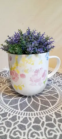 Mug vase with purple flower