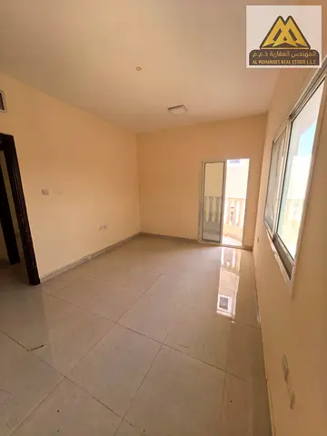 Two-bedroom apartment with a living room | Al Rawda 1 | For annual rent | Spacious | Close to all s