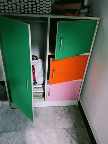 Small colorful storage cabinet with 4 doors — good condition
