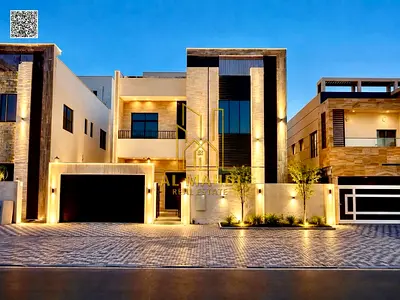 In our latest project in Al Alia, a luxurious 5-bedroom villa with a glass elevator and central air