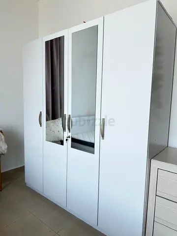 White 4-Door Wardrobe with Mirror — Good Condition