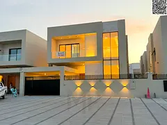 Modern villa with high-end finishes, large setback area in front of the villa, freehold ownership fo