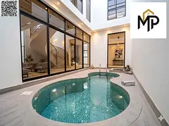 Own your luxurious villa in Ajman! Two floors plus a rooftop, with an indoor pool, air conditioning,