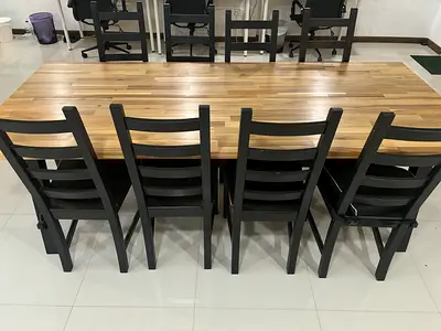 Wooden dining table with 8 wooden black chairs