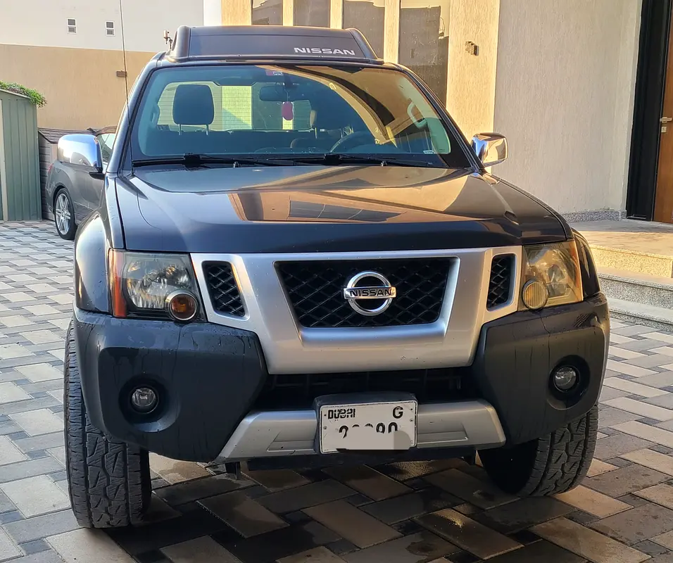 Nissan Xterra 2015 — photo 1 of 12