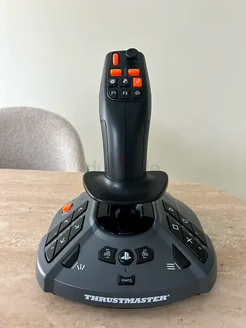 Thrust master flight simulator and farm stick joystick