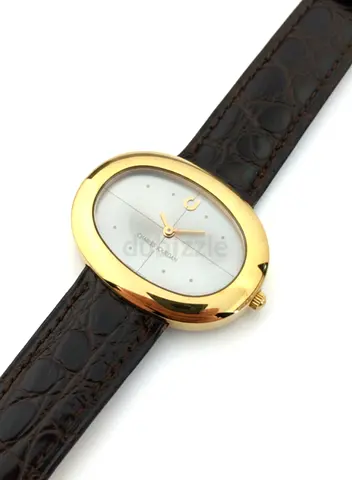 Gold-tone oval Charles Jourdan wrist watch with brown leather strap