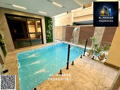 Own a luxury villa in Al Amerah, Ajman | 7 master bedrooms with a pool and rooftop | Competitive pr