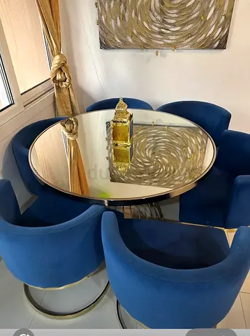 Round Glass Top Dining Table with 6 Blue Velvet Chairs