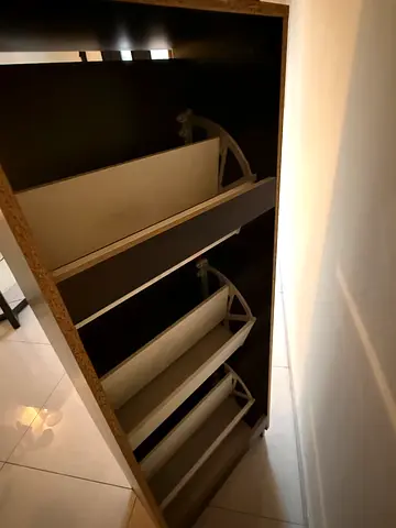 IKEA shoe cabinet in decent condition. Just needs a small repairs on the bottom shelf