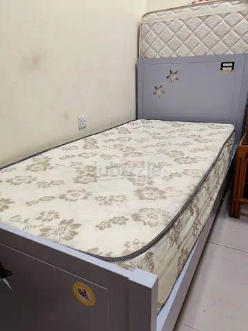 Single grey wooden bed frame with out mattress - good condition