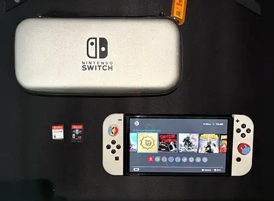 13 Games Free + Nintendo Switch Oled with case, 2 games (cartridges), GameSir switch Pro Controller