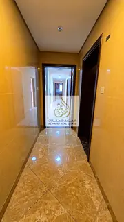 Al Nuaimiya 1, directly on Sheikh Khalifa Street: 2 bedrooms, a living room, and 3 bathrooms.